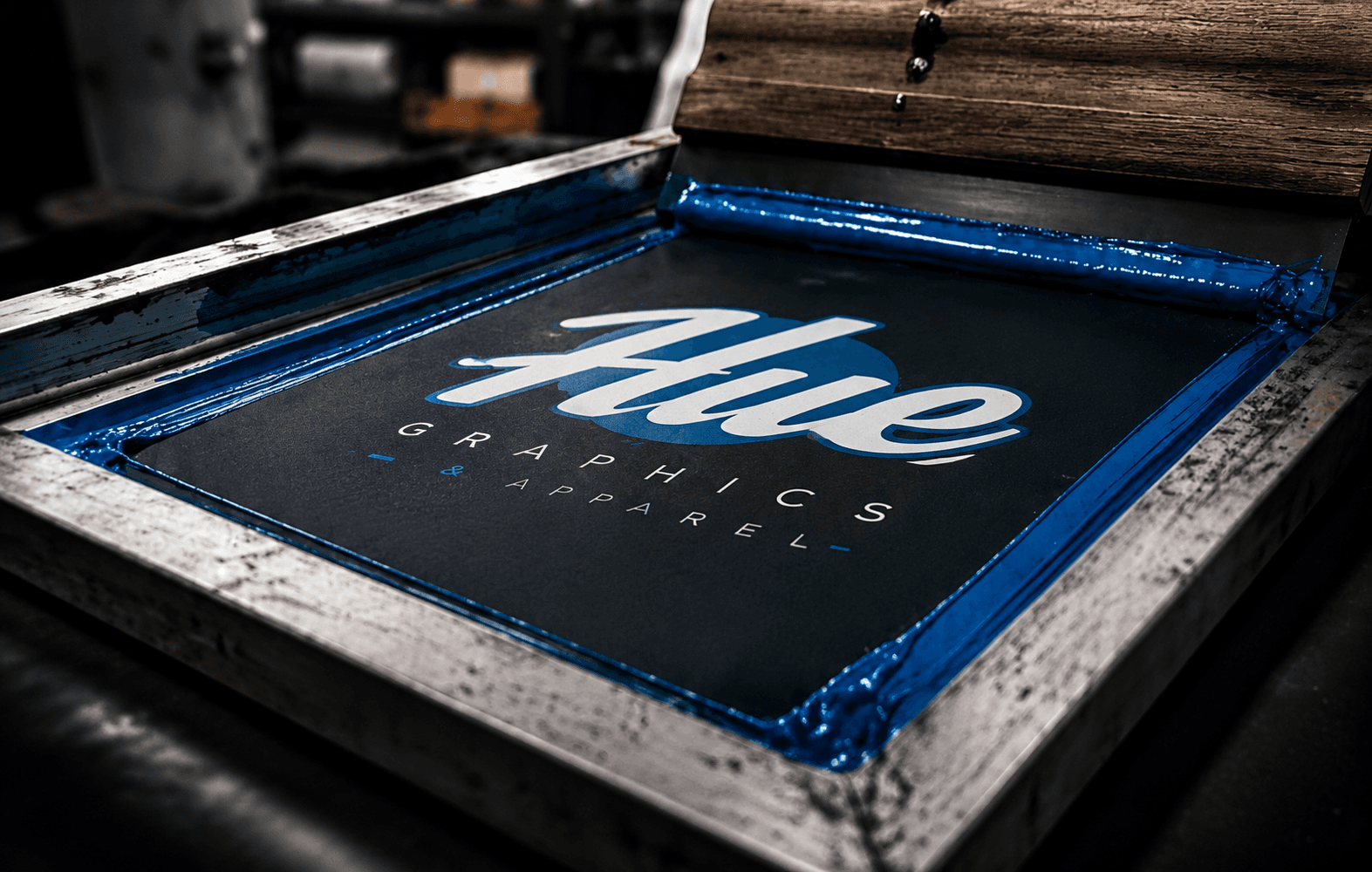 Hue Graphics screen printing frame with fresh blue ink